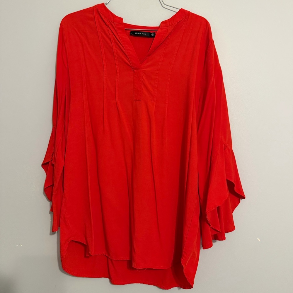 Red blouse by Doe and Rae